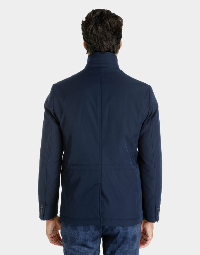 Field jacket blu imbottita in tessuto waterproof con scaldacollo