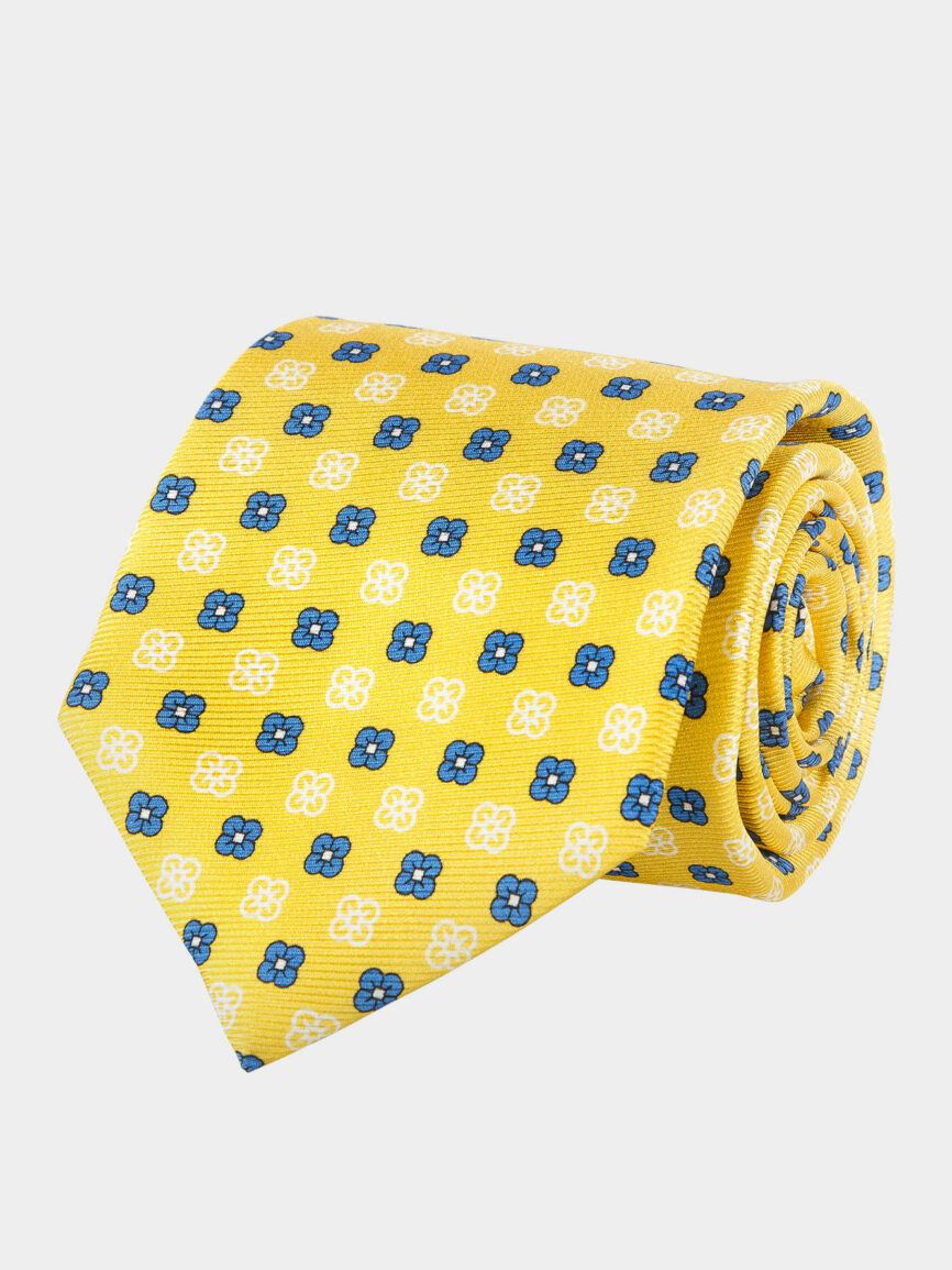 Cravatta motivo floreale in seta gialla