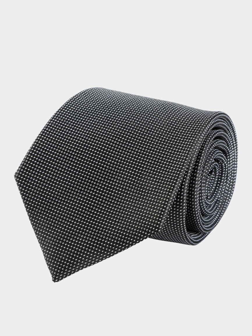 Dark gray silk tie with polka dot pattern