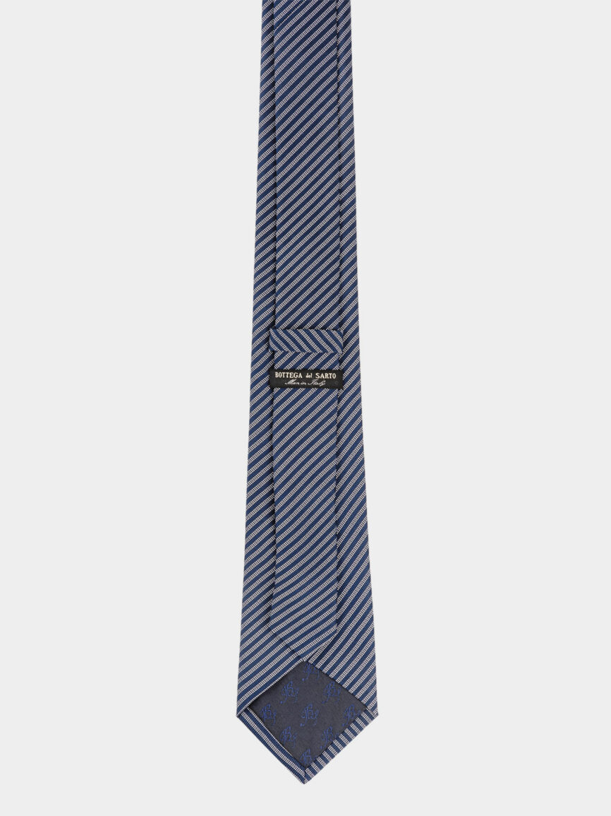 Blue silk tie with narrow Regimental pattern
