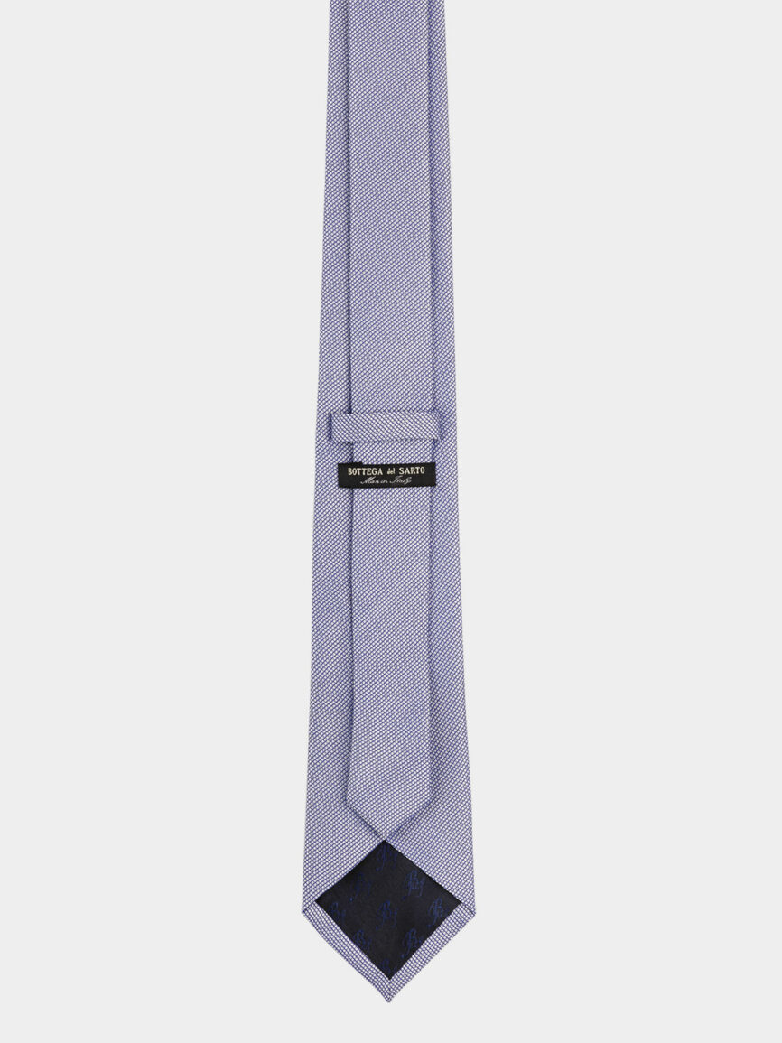 Light blue silk tie with micro patterning