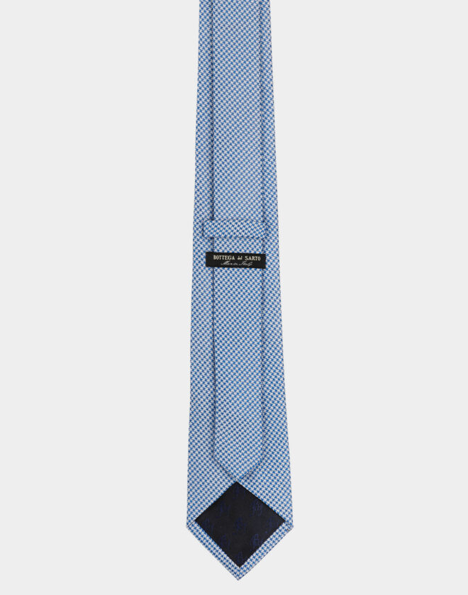 Cravatta in seta celeste con motivo pied-de-poule