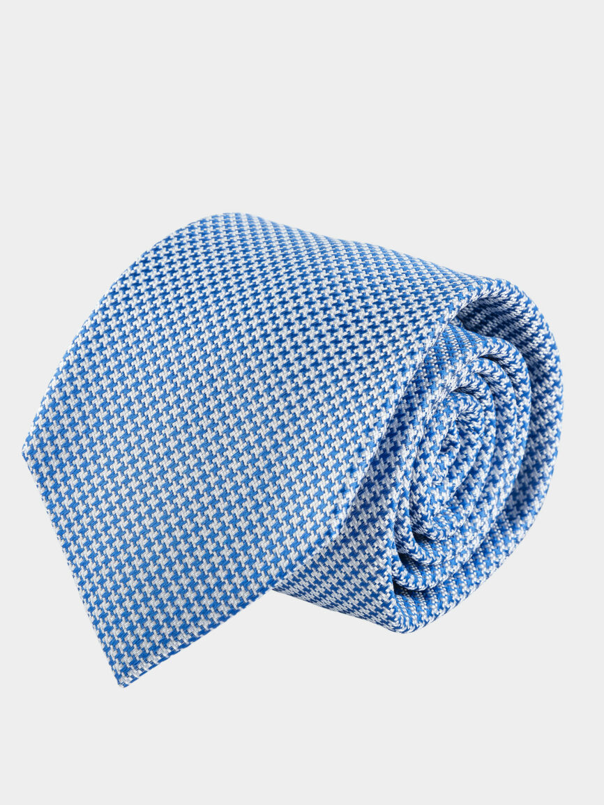 Light blue silk tie with houndstooth pattern