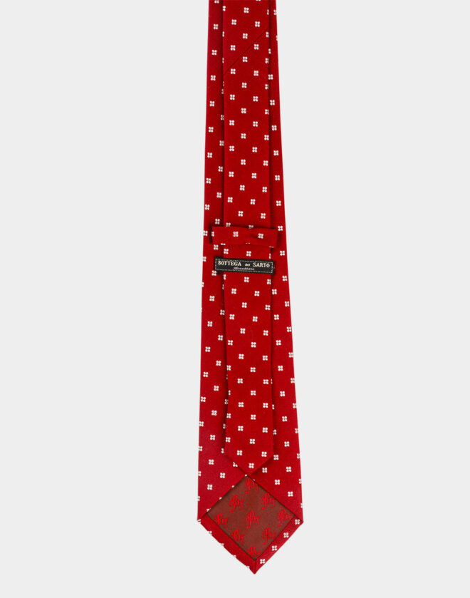 Red silk tie with patterned pattern