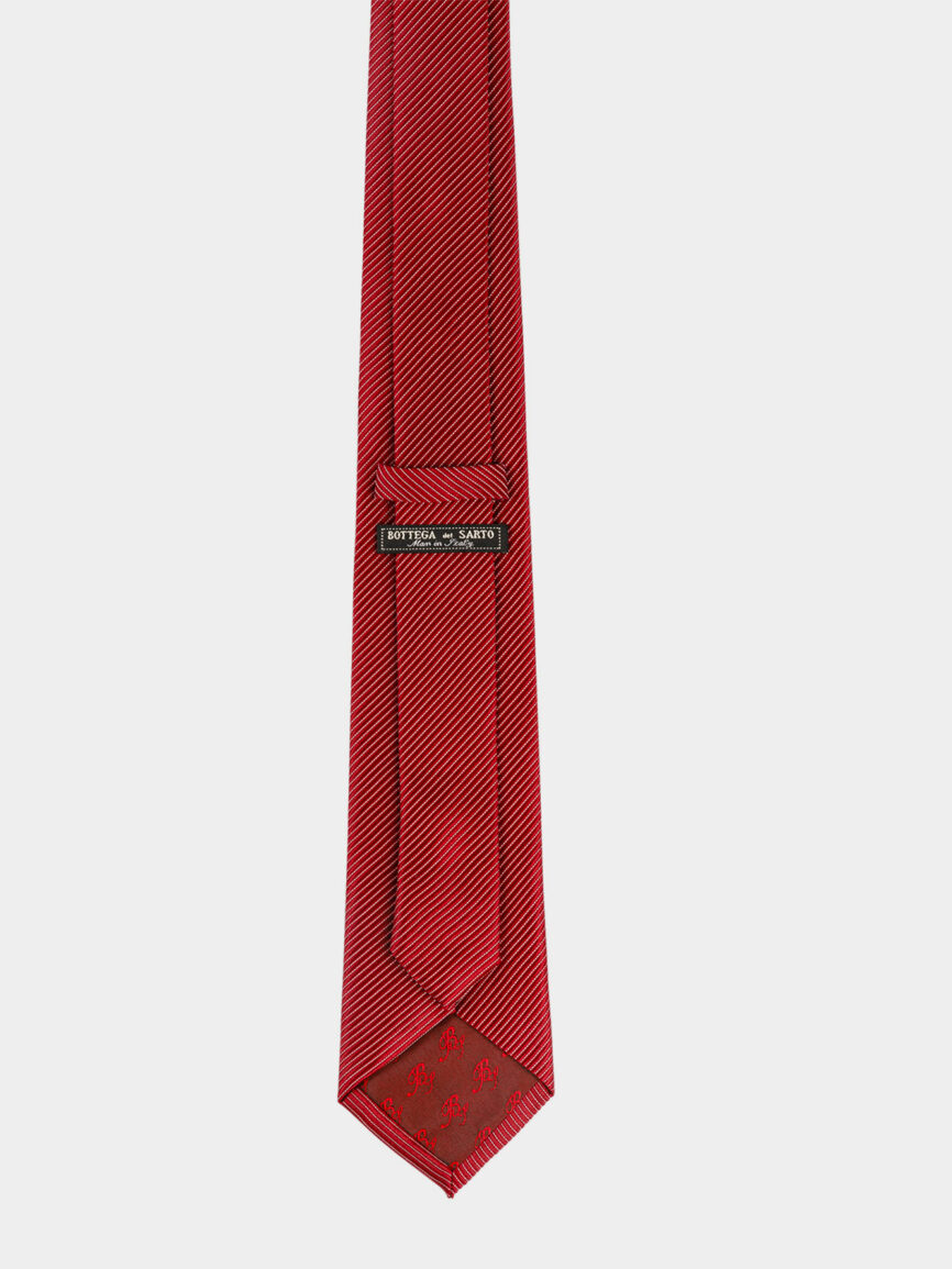 Dark red silk tie with narrow Regimental pattern