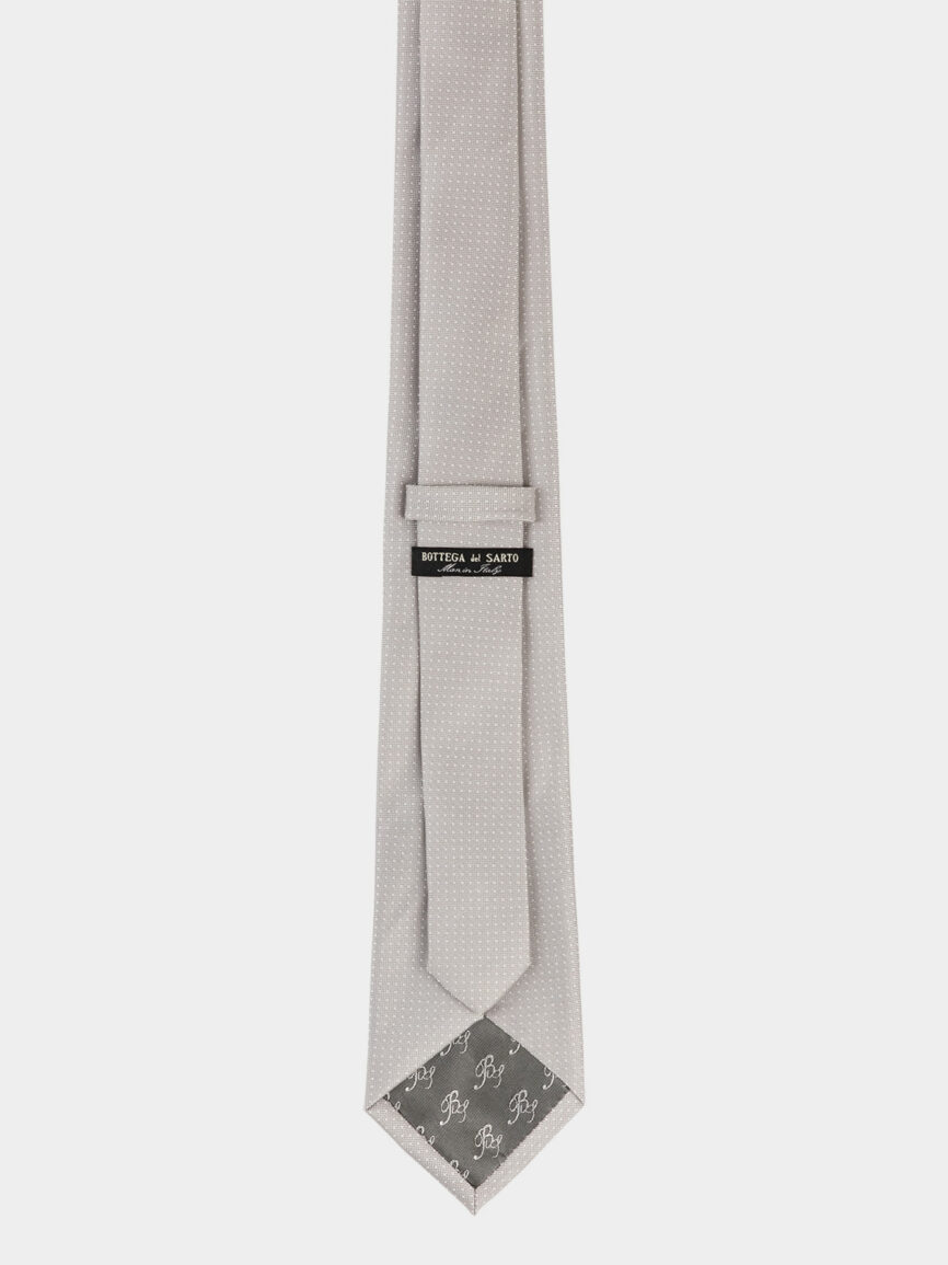 Cravatta in seta grigio chiaro con motivo a pois