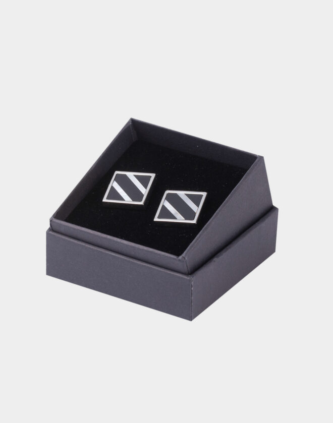 Square cufflinks with black design