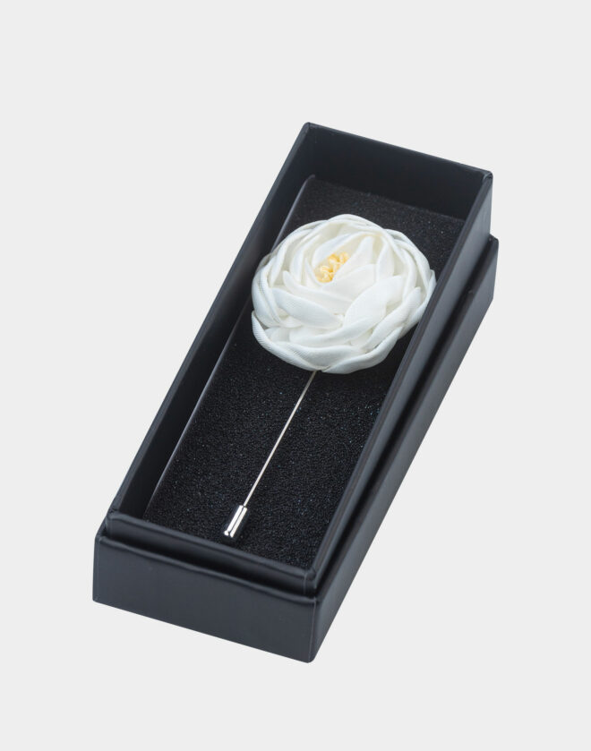 White flower brooch