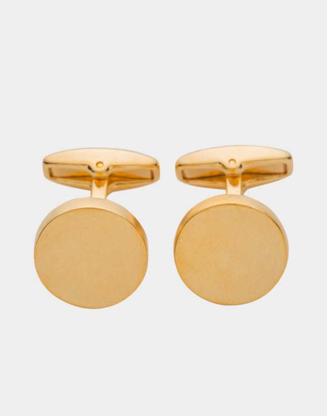 Gold-colored circular cufflinks