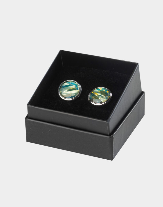 Circular cufflinks with colored stone